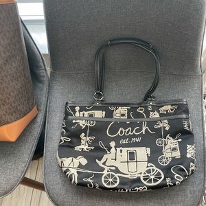 Authentic used Coach purse. Staining on the inside.
